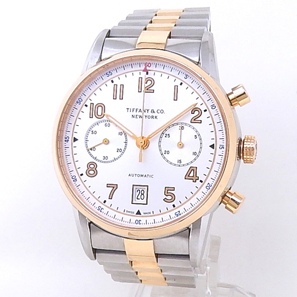 Tiffany & Co. CT60 Chronograph 36813865 Rose Gold & Steel Silver Dial: The Tiffany & Co. CT60 Chronograph, Reference 36813865, is an elegant fusion of vintage inspiration and modern metropolitan style. Crafted in a refined combination of 18k rose gold and stainless s