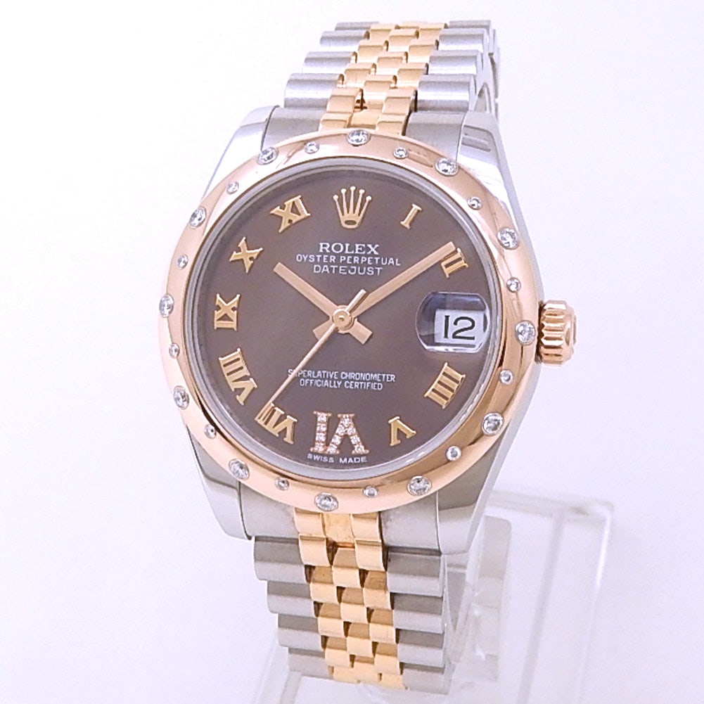 Rolex Datejust 31 178341 18k Everose Gold Steel Brown Diamond Dial: The Rolex Datejust 31, Reference 178341, is an elegant fusion of utility and luxury jewelry design. Crafted from a harmonious combination of 18k Everose gold and stainless steel, this exquisite mid-si