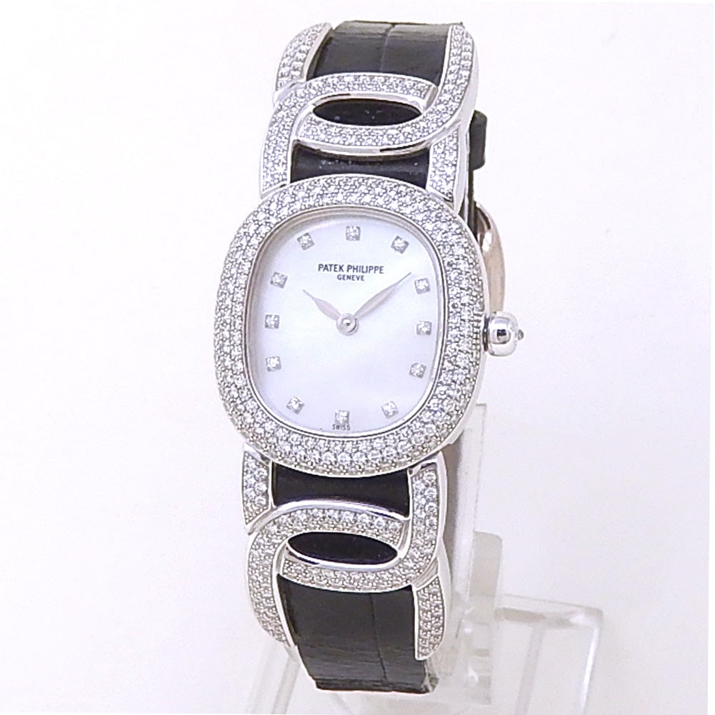 Patek Philippe Golden Ellipse 4832 18k White Gold Mother of Pearl Dial: The Patek Philippe Golden Ellipse, Reference 4832, is a superb expression of classic geometry and elegant watchmaking. Fashioned from luxury 18k white gold, the watch is defined by its iconic elliptic
