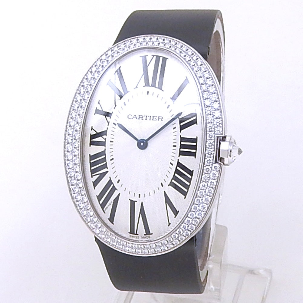 Cartier Baignoire WB520009 18k White Gold Diamond Silver Dial: The Cartier Baignoire, Reference WB520009, is an exquisite expression of classic Parisian style and feminine grace. Crafted from luxurious 18k white gold, its iconic oval case frame is spectacularly s