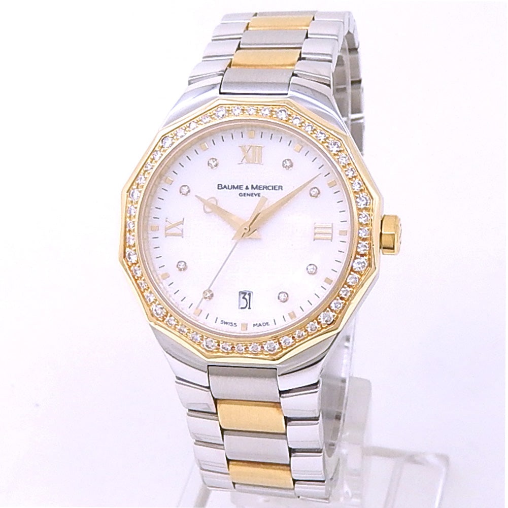 Baume & Mercier Riviera 65474 18k Yellow Gold & Stainless Steel Mother of Pearl Dial: The Baume & Mercier Riviera, Reference 65474, is a refined expression of the brand's iconic sports-chic aesthetic. This ladies' timepiece unites an 18k yellow gold and stainless steel case with a lumi