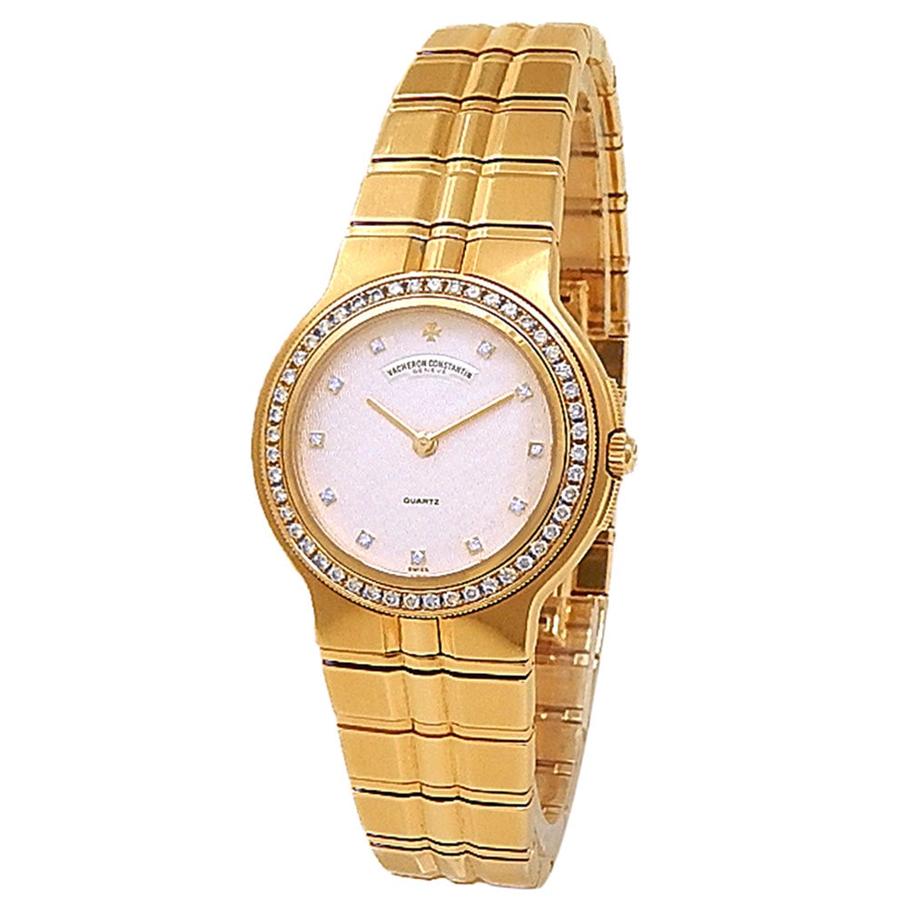 Vacheron Constantin Phidias 16520/967J-8193 18k Yellow Gold Silver Diamond Dial: The Vacheron Constantin Phidias, Reference 16520/967J-8193, is an exquisite testament to the historical manufacturer's artistry. Sculpted in brilliant 18k yellow gold, this magnificent ladies' timepie
