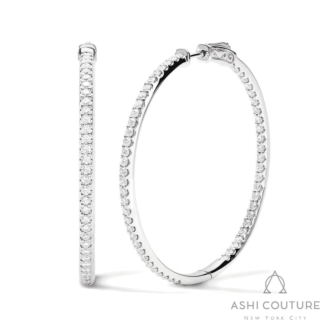 2.5 ctw Diamond 18K White Gold Hoop Earrings: Retail Value: $18,390 An exquisite masterpiece of haute joaillerie, this stunning Classic pair of earrings featuring White Diamond is a true treasure. Expertly mounted in a Hoop setting, the earrings 