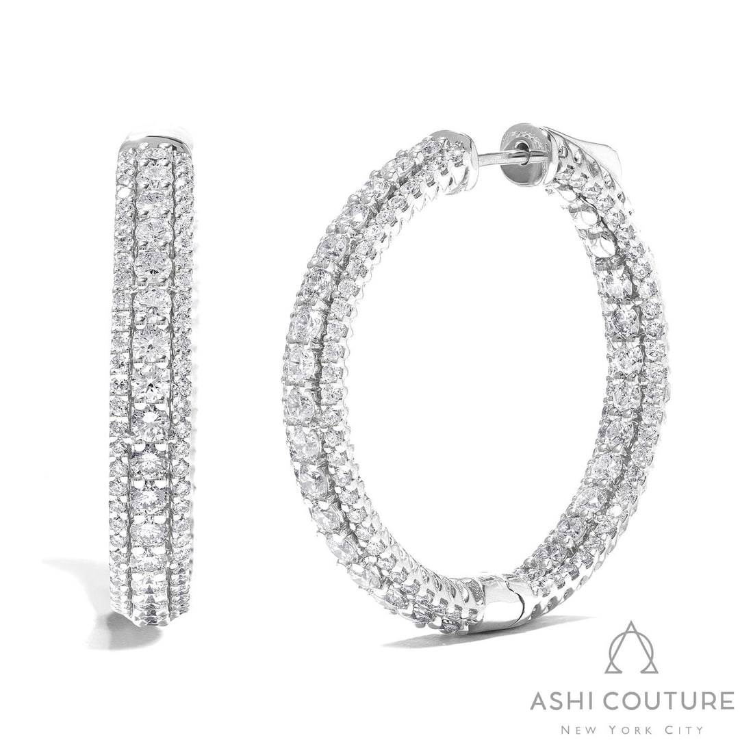 4.08 ctw Duchess 3-Row Diamond Hoop 18K White Gold Earrings: Retail Value: $23,430 Epitomizing grandeur, this magnificent 3-Row Hoop pair of earrings featuring White Diamond stands as a beacon of refined taste. Expertly mounted in a Hoop setting, the earrings a