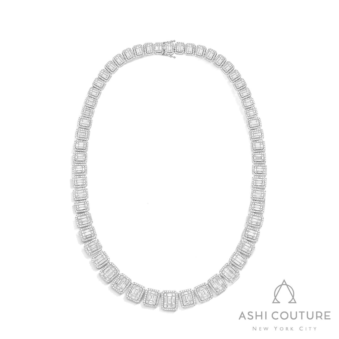 Empress 23.84 ctw Diamond Baguette and Round 18K White Gold Riviera Necklace: A testament to superior craftsmanship, this breathtaking Riviera necklace featuring Natural White Diamonds is unparalleled. Showcasing the gems in a Halo arrangement, the necklace consists of 78.2 gra