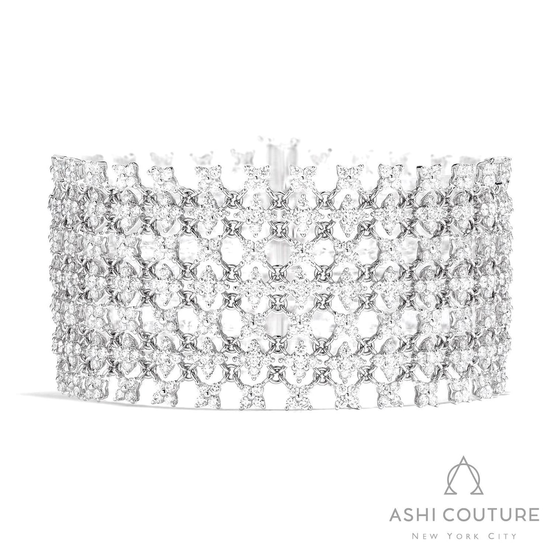 16.88 ctw White Diamond Silk Floral Wide 18K White Gold Bracelet: Timeless and sophisticated, this breathtaking Floral Wide bracelet featuring White Diamond radiates enduring beauty. Securely held in a classic Lattice Cluster design, the bracelet is forged from 42.0