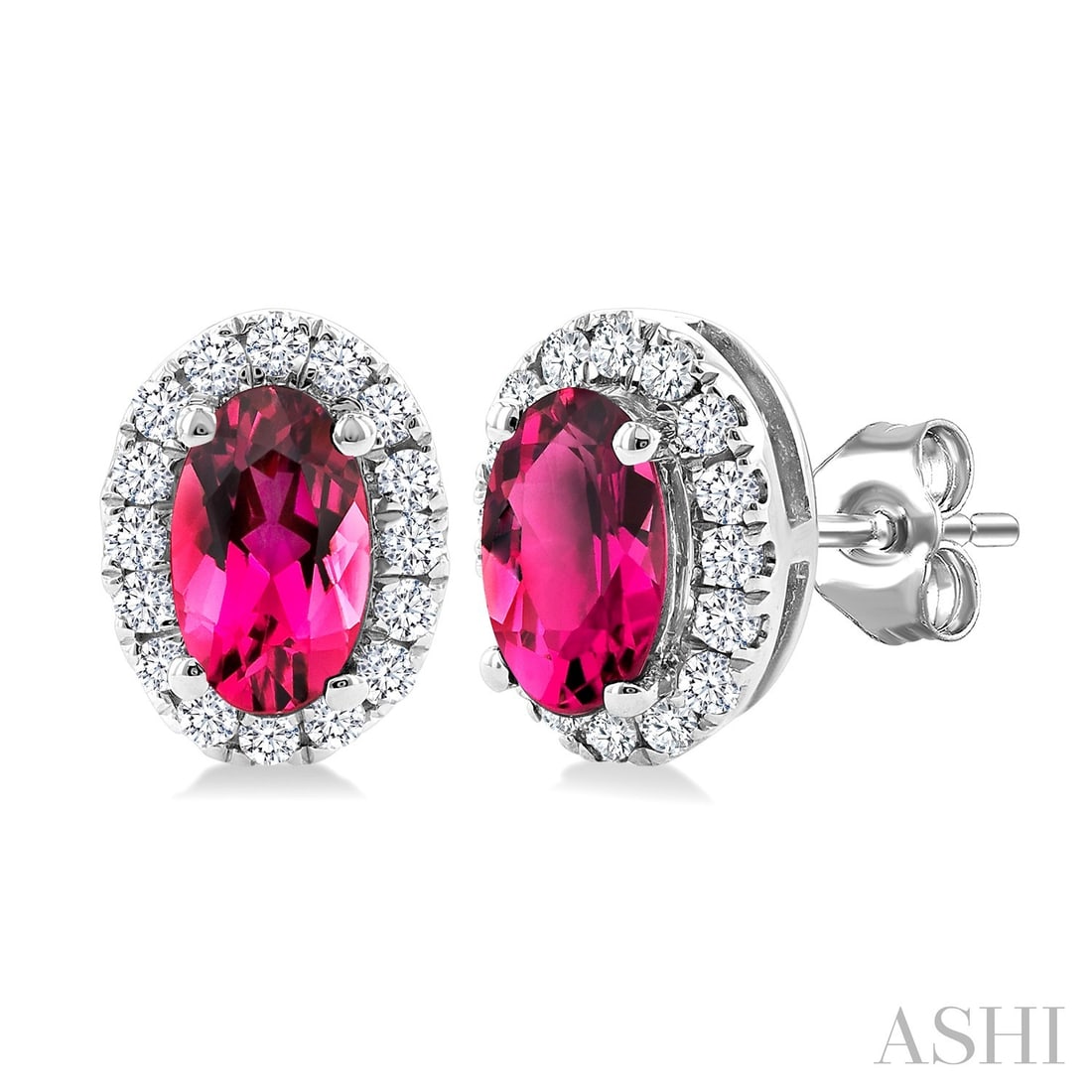 5x3mm Pink Tourmaline and 0.14 ctw Diamond 14K White Gold Stud Earrings: Timeless and sophisticated, this elegant Halo pair of earrings featuring Pink Tourmaline, White Diamond radiates enduring beauty. Expertly mounted in a Halo setting, the earrings are crafted in 0.85 g