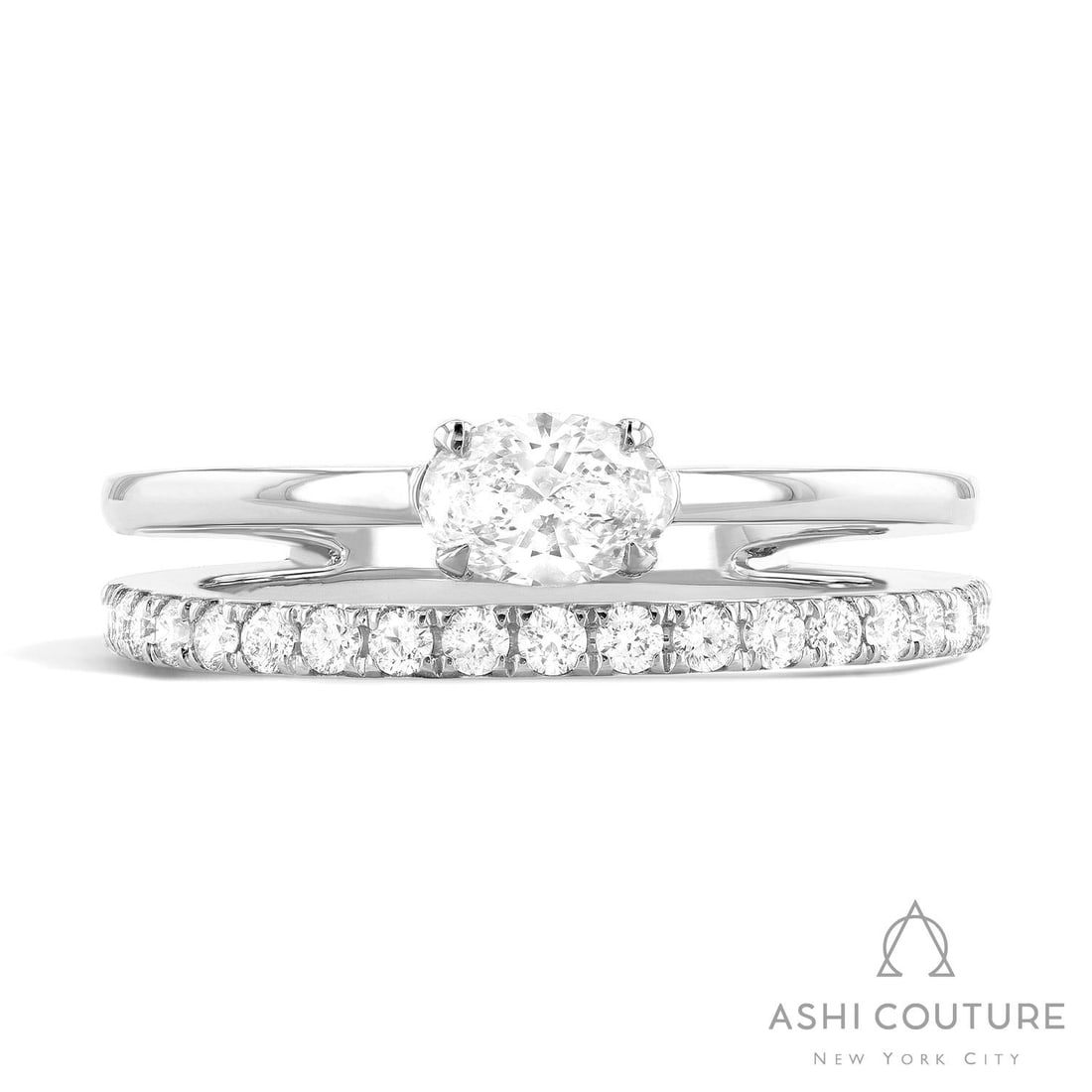 0.74 ctw Oval Diamond Paradox 18K White Gold Ring: Defining modern elegance, this stunning Paradox ring featuring Colorless Diamond captures the essence of style. Expertly mounted in a Bypass setting, the ring is crafted in 5.4 grams of solid 18K Whit