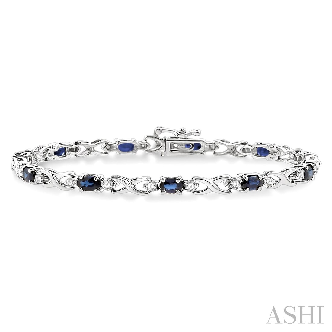 5x3mm Oval Sapphire and 0.10 ctw Diamond 10K White Gold Bracelet: Timeless and sophisticated, this elegant tennis bracelet featuring Blue Sapphire, White Diamond radiates enduring beauty. Expertly mounted in a Link setting, the bracelet is crafted in 7.8 grams of so