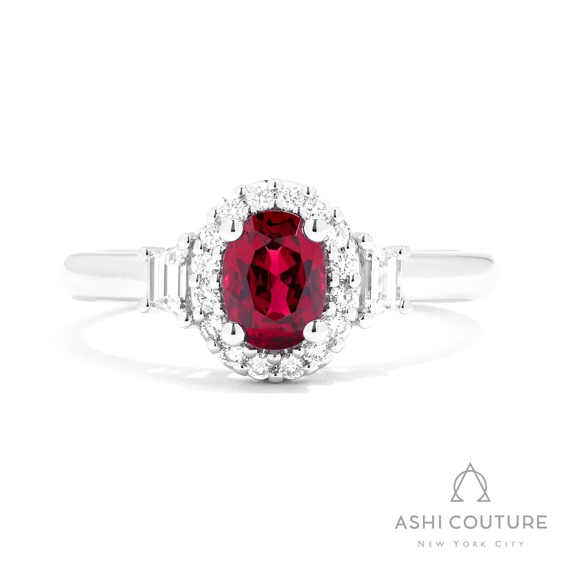 Oval Ruby and 0.29 ctw Diamond Halo 18k White Gold Ring: Retail Value: $6,315 An exquisite masterpiece of haute joaillerie, this magnificent Halo, 3-Stone ring featuring Ruby, White Diamond is a true treasure. Showcasing the gems in a Halo arrangement, the 