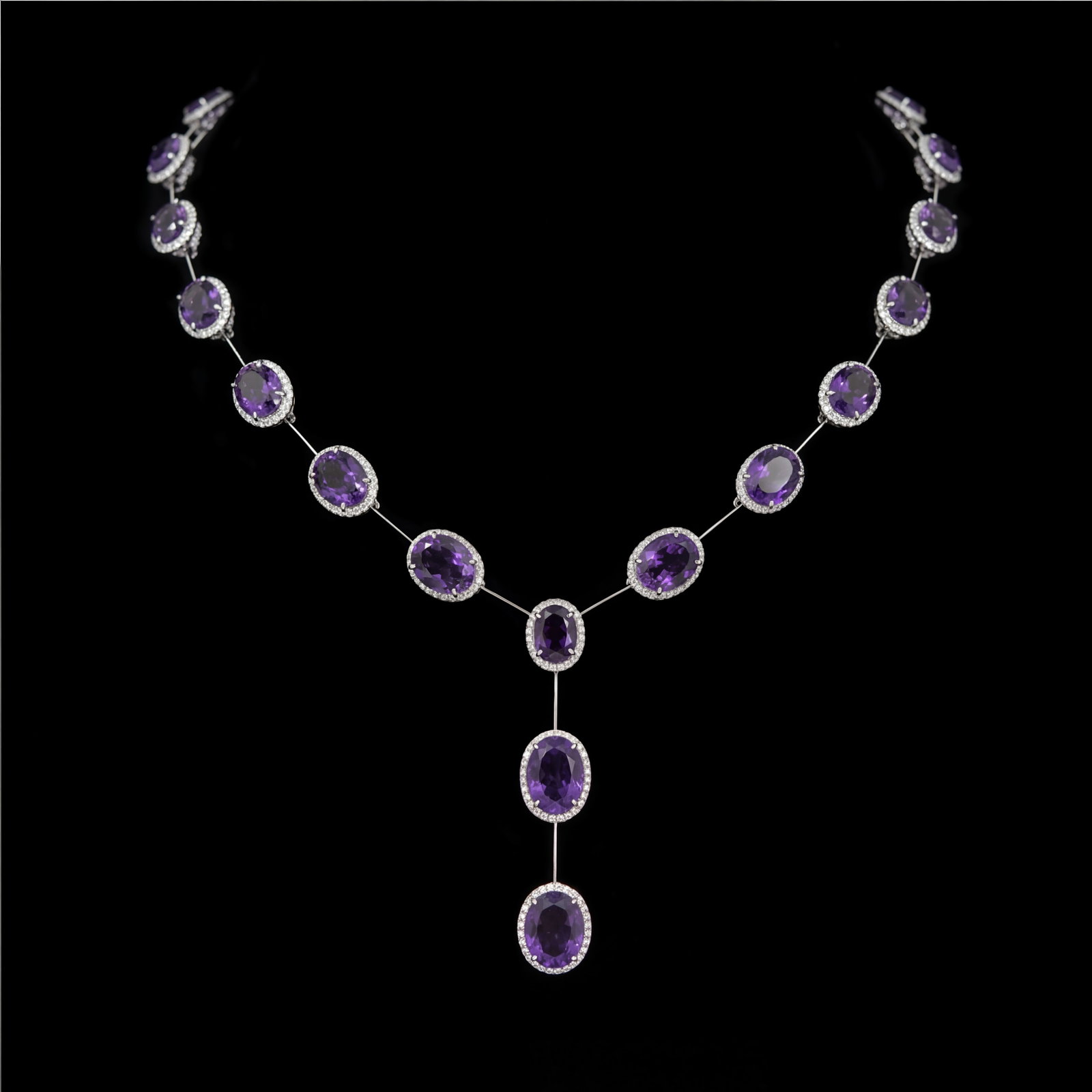 60.85ct Amethyst and 7.2 ctw White Diamond Platinum Necklace: Retail Value: $74,010 Timeless and sophisticated, this stunning Your Highness necklace featuring Amethyst, White Diamond radiates enduring beauty. The gemstones are nestled within a Bezel with Diamond