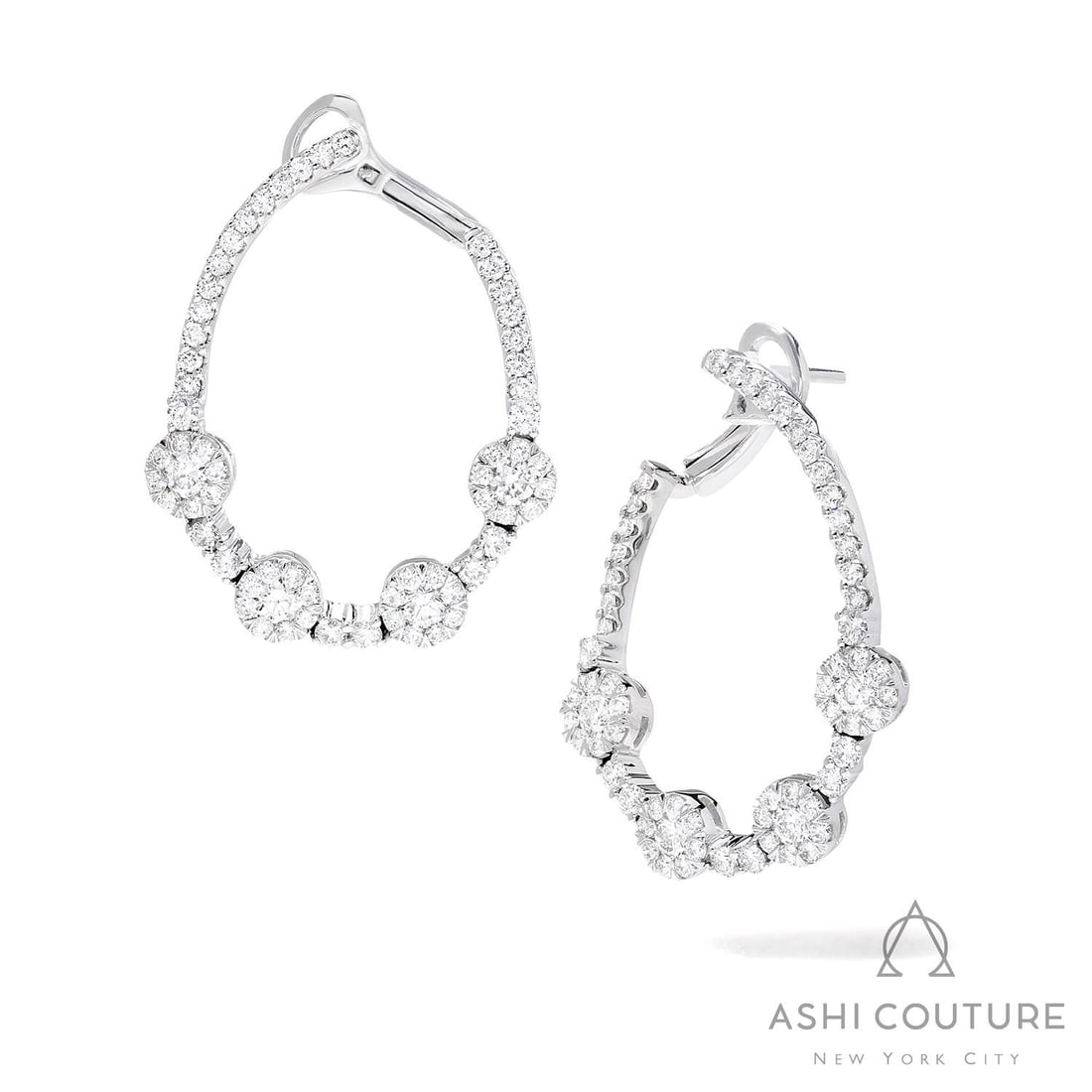 2.02 ctw White Diamond Fiori Round Station Hoop Cluster 18K White Gold Earrings: A vision of luxury, this stunning Fiori Round Station Hoop Cluster pair of earrings featuring White Diamond defines sophistication. The gemstones are nestled within a Diamond Cluster Hoop framework, s