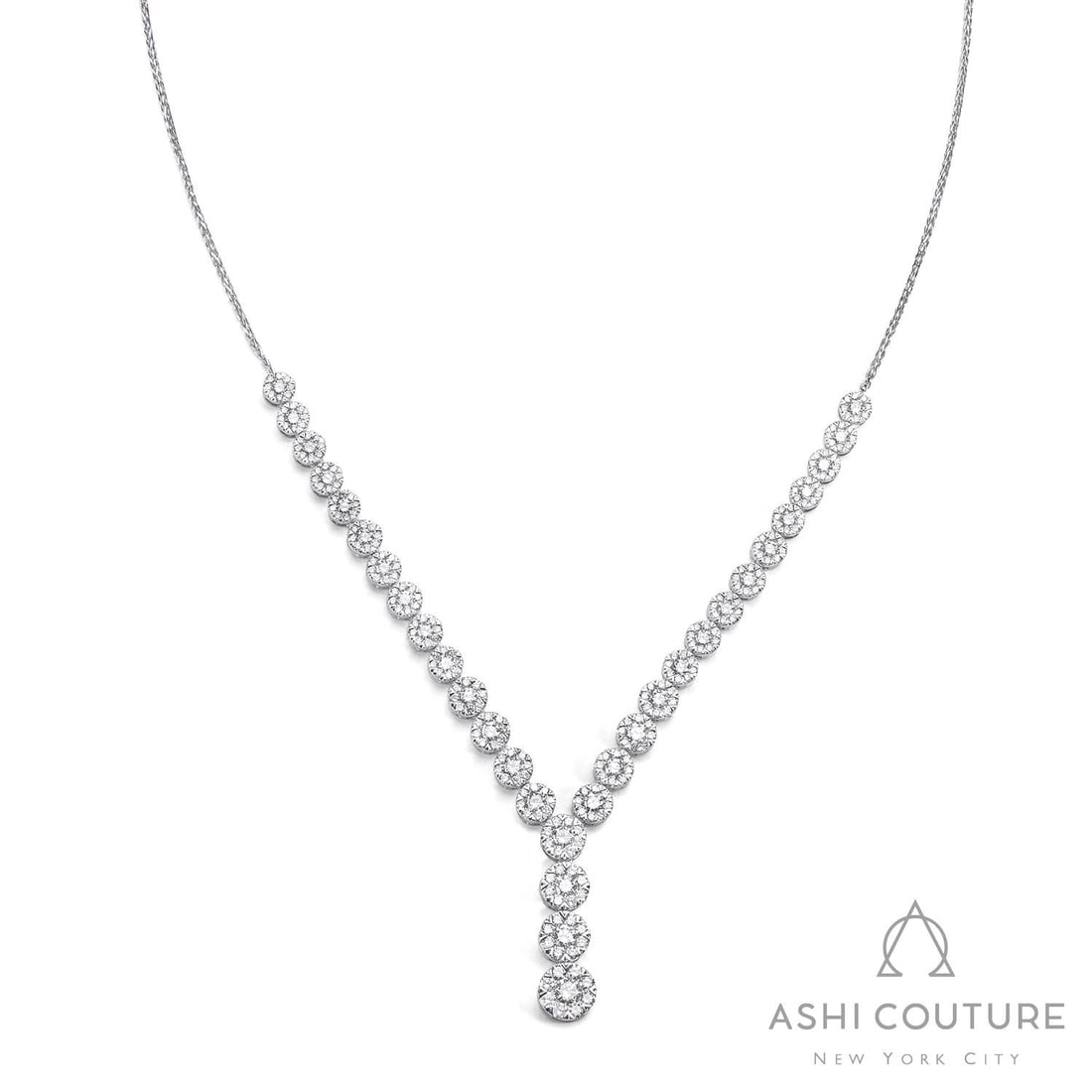 3.24 ctw White Diamond Cluster 18K White Gold Lariat Necklace: Rare and radiant, this magnificent Cluster necklace featuring White Diamond offers a touch of the extraordinary. Showcasing the gems in a Cluster arrangement, the necklace consists of 8.45 grams of 18