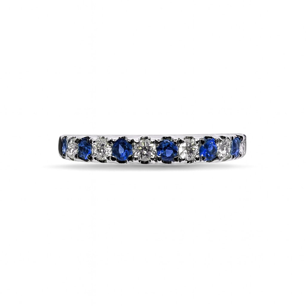 0.55ctw Sapphire & Diamond Alternating Band Ring 14K White Gold: Exuding opulence and grace, this exquisite Alternating ring featuring Blue Sapphire, White Diamond is crafted for the distinguished. Crafted with precision, the Shared Prong setting is seamlessly inte