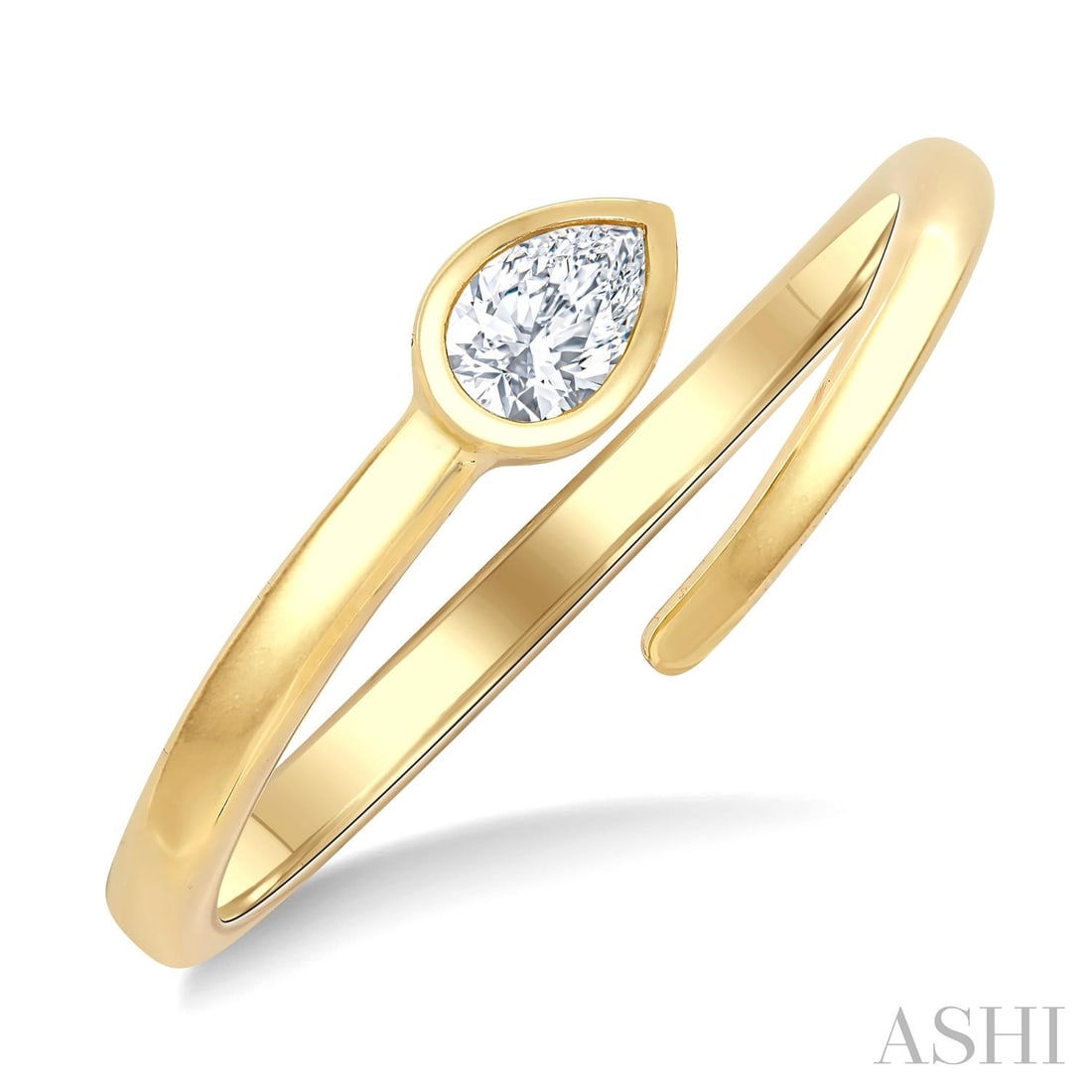 0.15 ctw Pear Cut Diamond Bypass Open Fashion 14K Yellow Gold Ring: Defining modern elegance, this elegant Bypass ring featuring White Diamond captures the essence of style. The gemstones are nestled within a Bypass framework, supported by a substantial 2.4 grams 14K 