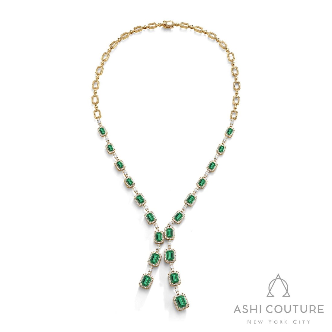 Emerald and 4.48 ctw Diamond 18K Yellow Gold Necklace: Timeless and sophisticated, this magnificent Kaleidoscope Emerald Split necklace featuring Emerald, White Diamond radiates enduring beauty. The gemstones are nestled within a Halo framework, supported