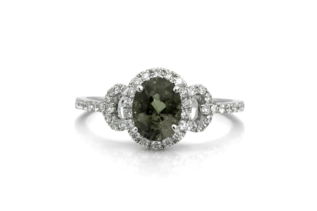 1.02ct Oval Alexandrite and 0.36ctw Diamond 14K White Gold Ring: A vision of luxury, this breathtaking Halo ring featuring Alexandrite, White Diamond defines sophistication. Securely held in a classic Halo design, the ring is forged from 2.23 grams of high-polish 1