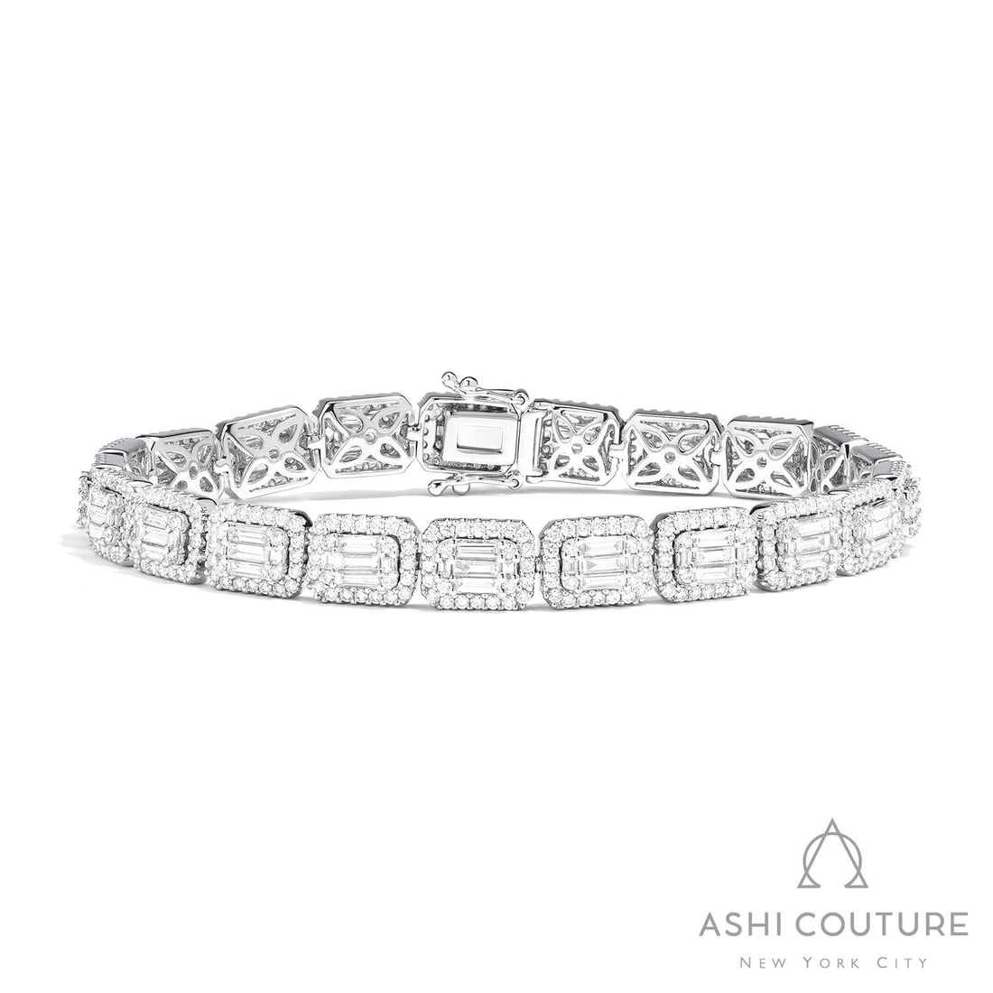 6.91 ctw Baguette and Round Diamond 18K White Gold Tennis Bracelet: Defining modern elegance, this magnificent Empress Baguette bracelet featuring White Diamond captures the essence of style. Securely held in a classic Halo design, the bracelet is forged from 23.7 gra
