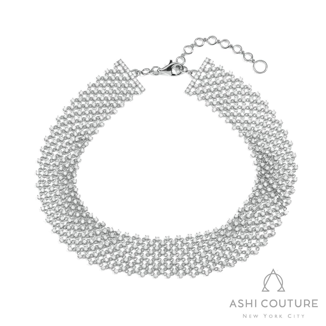 12.82 ctw White Diamond 18K White Gold Choker: A testament to superior craftsmanship, this breathtaking Silk Mesh choker featuring White Diamond is unparalleled. Showcasing the gems in a Continuous Mesh/Pave arrangement, the choker consists of 30.