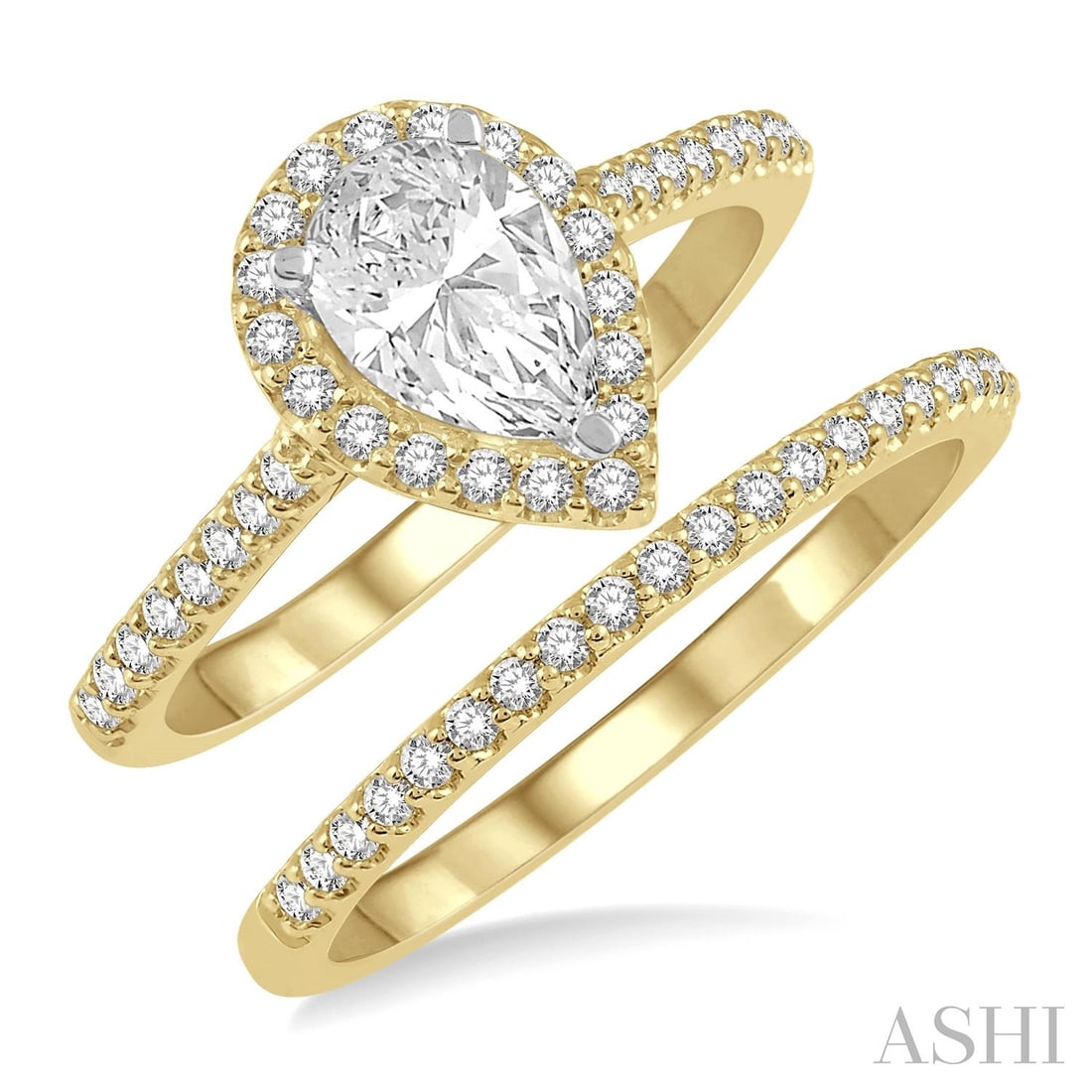 0.53 ctw Pear Diamond Halo Wedding Set 14K Yellow & White Gold: An exquisite masterpiece of haute joaillerie, this magnificent Halo ring set featuring Natural Diamonds is a true treasure. Crafted with precision, the Halo setting is seamlessly integrated into 4.65 