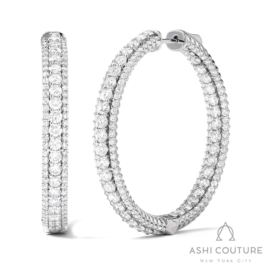 Duchess 6.23 ctw Diamond 18K White Gold Hoop Earrings: Retail Value: $29,235 An exquisite masterpiece of haute joaillerie, this magnificent Duchess 3-Row pair of earrings featuring White Diamond is a true treasure. The gemstones are nestled within a Tripl