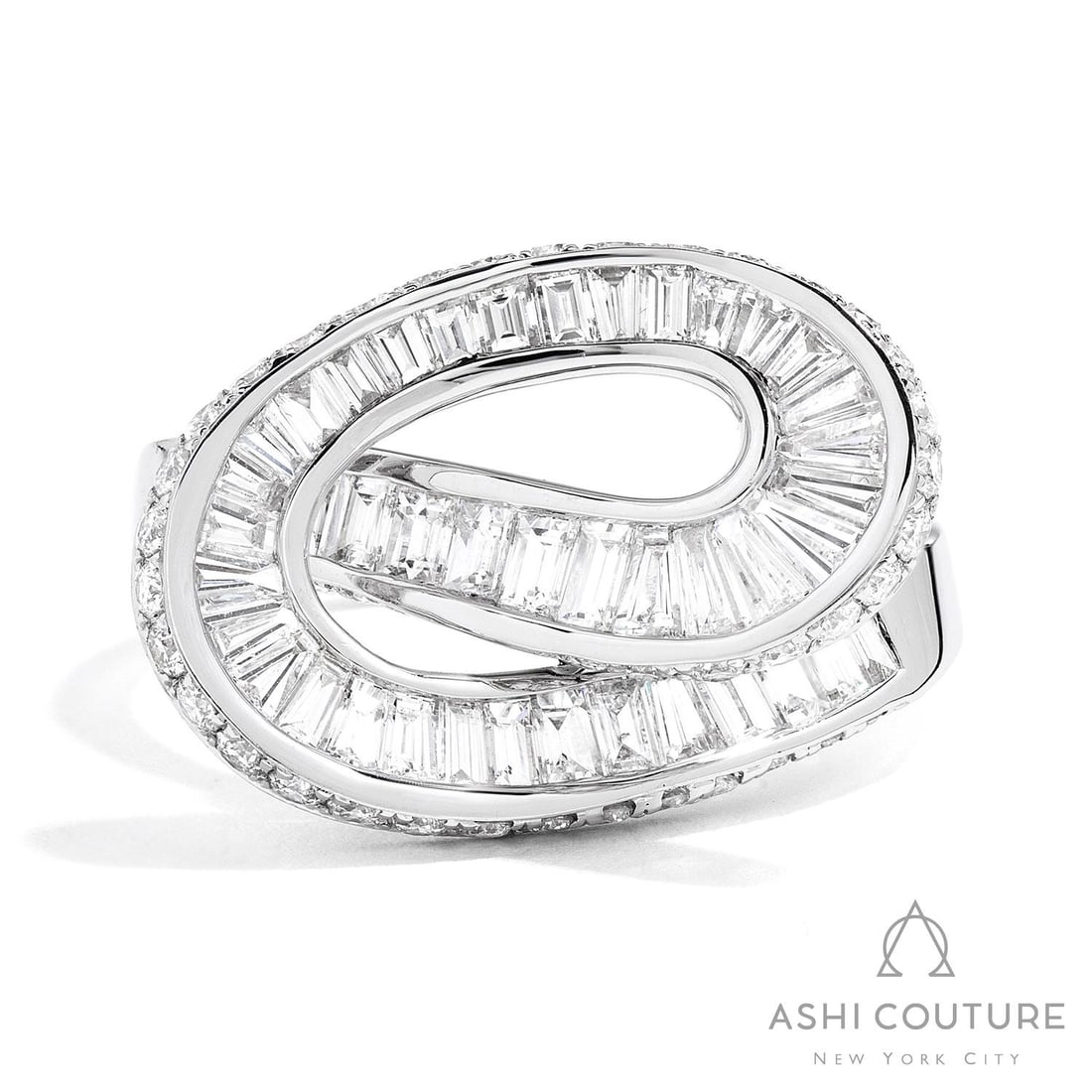 1.88 ctw Baguette & Round Diamond Ribbon 18K White Gold Ring: Epitomizing grandeur, this magnificent Ribbon Bypass ring featuring White Diamond stands as a beacon of refined taste. Crafted with precision, the Ribbon Bypass setting is seamlessly integrated into 5