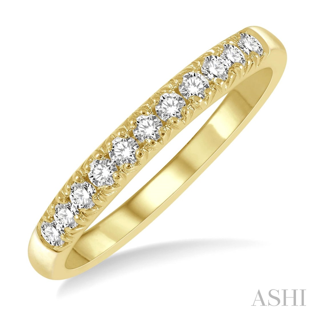 0.26 ctw 11-Stone Round Diamond Pave 14K Yellow Gold Wedding Band: A vision of luxury, this elegant 11 Stone ring featuring White Diamond defines sophistication. The gemstones are nestled within a Pave framework, supported by a substantial 2.5 grams 14K Yellow Gold b