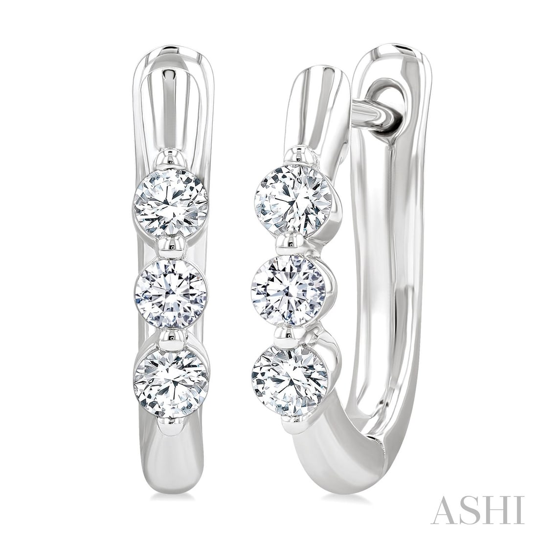 0.34 ctw Diamond 14K White Gold Hoop Earrings: Rare and radiant, this stunning Three-Stone pair of earrings featuring White Diamond offers a touch of the extraordinary. A detailed Three-Stone gallery secures the stones, rendered in 2.35 grams of l