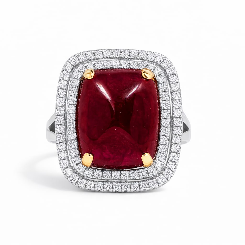 10.20ct Ruby and 0.40ctw Diamond 14K White Gold Ring: Captured in a moment of brilliance, this magnificent Halo ring featuring Ruby, White Diamond speaks to the connoisseur. Securely held in a classic Halo design, the ring is forged from 6.54 grams of hi