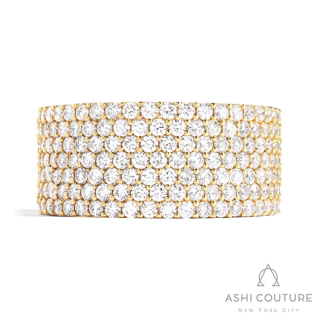 2.05 ctw White Diamond 7-Row Pave 18K Yellow Gold Band Ring: Defining modern elegance, this magnificent 7-Row Classic ring featuring White Diamond captures the essence of style. Securely held in a classic Pave Band design, the ring is forged from 10.05 grams of