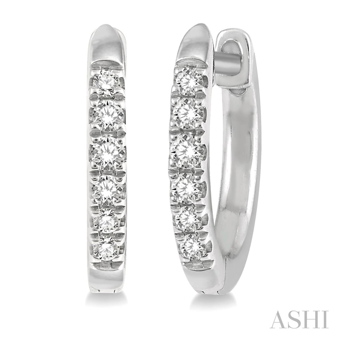 0.12 ctw Diamond 14K White Gold Huggie Petite Earrings: Timeless and sophisticated, this elegant Huggie pair of earrings featuring White Diamond radiates enduring beauty. The gemstones are nestled within a Shared Prong framework, supported by a substantial