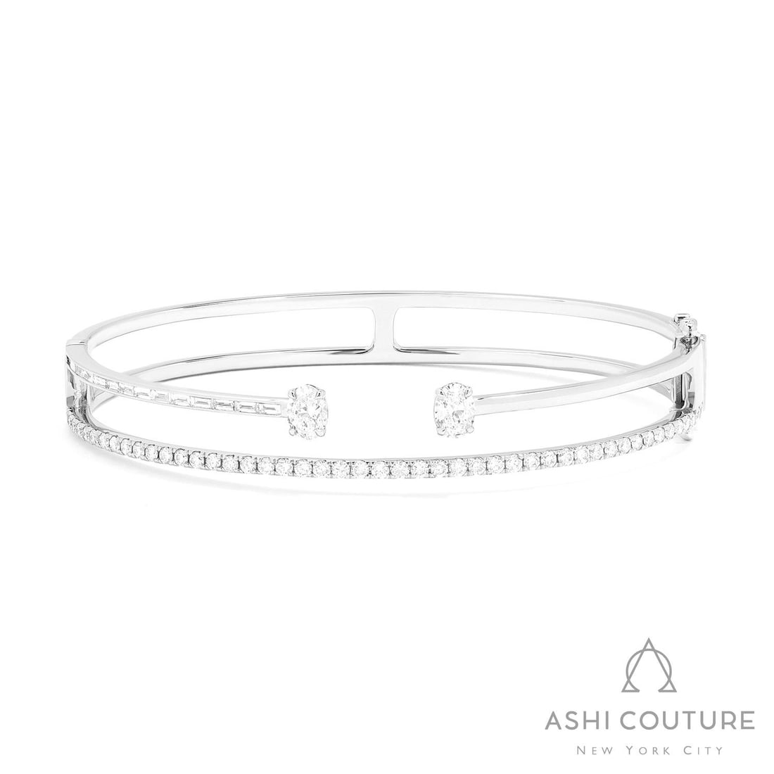 1.87 ctw Mixed Cut Diamond 18K White Gold 2-Row Bangle Bracelet: Retail Value: $21,840 A testament to superior craftsmanship, this stunning 2-Row bracelet featuring White Diamond is unparalleled. The gemstones are nestled within an Open Bangle framework, supported 