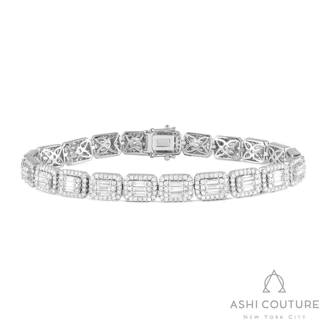 5.02 ctw White Diamond Empress Baguette Tennis 18K White Gold Bracelet: Timeless and sophisticated, this breathtaking Empress Baguette Tennis bracelet featuring White Diamond radiates enduring beauty. The gemstones are nestled within a Halo framework, supported by a subst