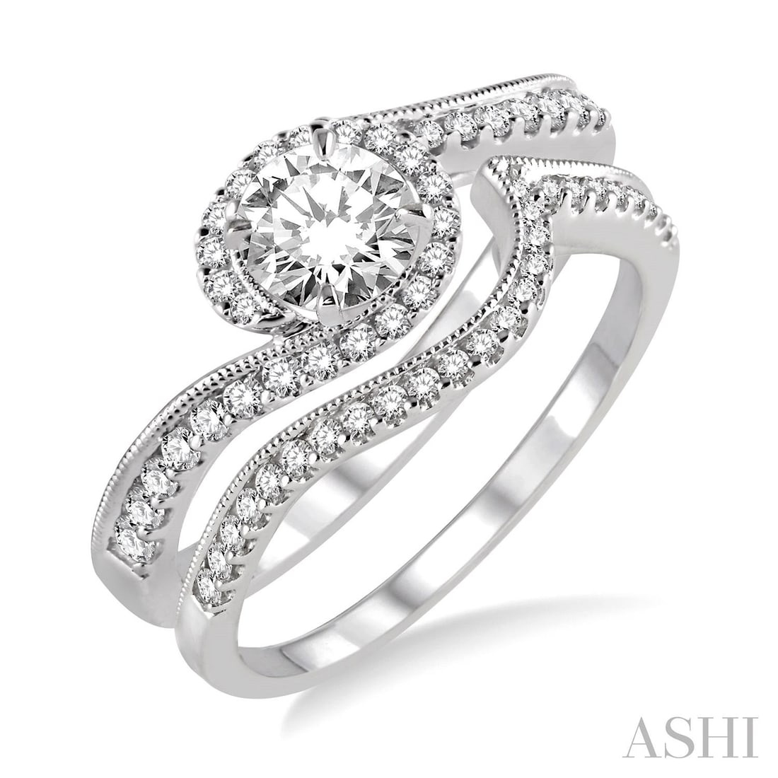 0.59 ctw Diamond Halo Wedding Set 14K White Gold: Epitomizing grandeur, this exquisite Halo set of rings featuring White Diamond stands as a beacon of refined taste. Showcasing the gems in a Halo arrangement, the set of rings consists of 4.2 grams of