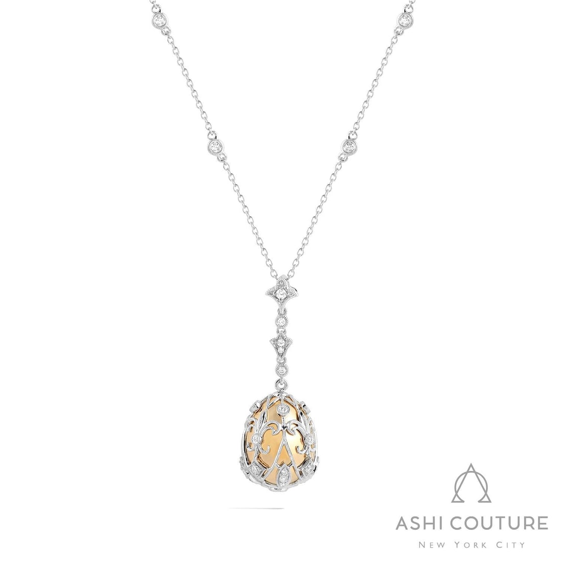 0.72 ctw Diamond Cage Drop 18K Yellow & White Gold Pendant: Timeless and sophisticated, this breathtaking Cage Drop pendant featuring White Diamond radiates enduring beauty. Securely held in a classic Cage/Filigree design, the pendant is forged from 7.0 grams 