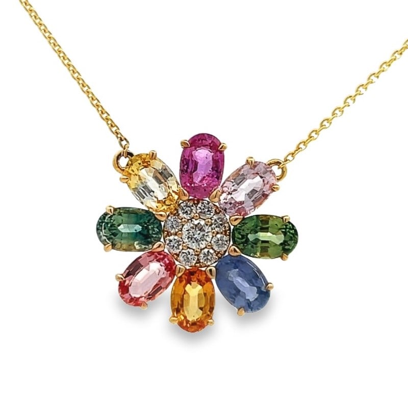 5.44ct Multicolor Sapphire and 0.25ctw Diamond 18K Yellow Gold Pendant: An exquisite masterpiece of haute joaillerie, this exquisite Flower pendant featuring Multicolor Sapphire, White Diamond is a true treasure. Showcasing the gems in a Cluster arrangement, the pendant c