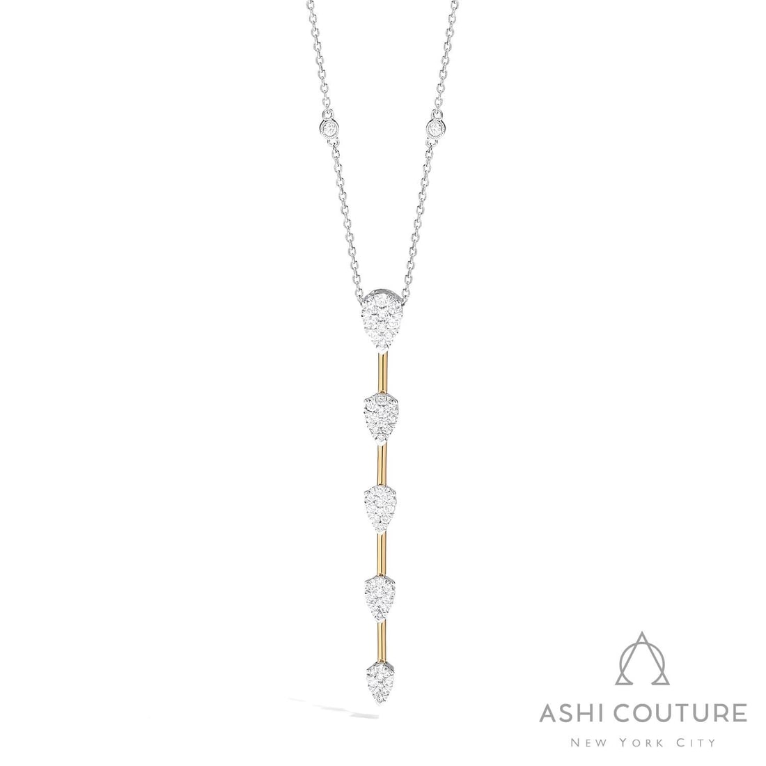 1.16 ctw Diamond Fiori Pear Station Bar Long Cluster 18K Yellow & White Gold Pendant Necklace: An exquisite masterpiece of haute joaillerie, this breathtaking Fiori Pear Station Bar pendant necklace featuring White Diamond is a true treasure. Showcasing the gems in a Lariat/Station arrangement,