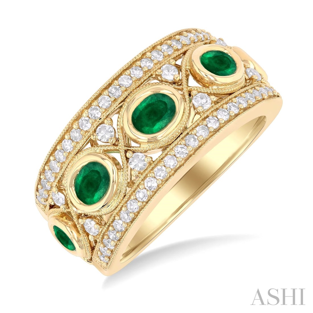 4x3mm Oval Emerald and 0.40 ctw Diamond Criss Cross 14K Yellow Gold Band Ring: A symphony of light and color, this magnificent Criss Cross ring featuring Emerald, White Diamond embodies the pinnacle of luxury. Expertly mounted in a Wide Band setting, the ring is crafted in 6.45 