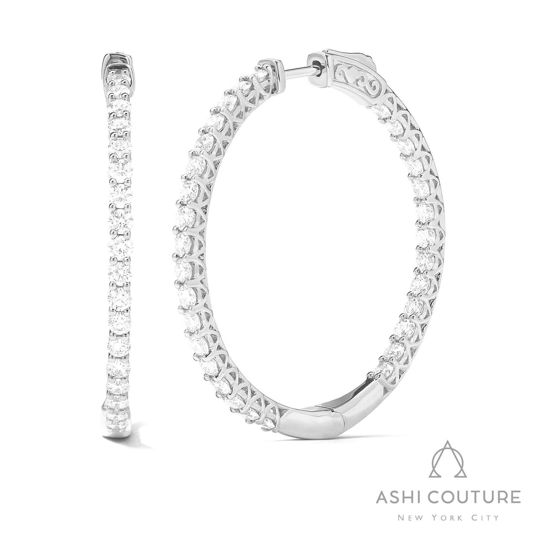 1.42 ctw Diamond 18K White Gold Hoop Earrings: Retail Value: $11,655 Timeless and sophisticated, this elegant Classic pair of earrings featuring White Diamond radiates enduring beauty. Crafted with precision, the Eternity style hoop setting is sea