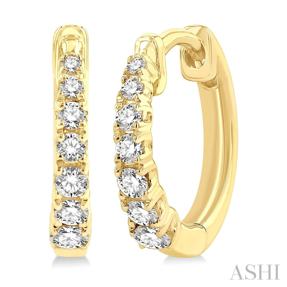 0.25 ctw Graduated Diamond 10K Yellow Gold Huggie Earrings: Defining modern elegance, this stunning Graduated Round Cut pair of earrings featuring White Diamond captures the essence of style. The gemstones are nestled within a Shared Prong framework, supported