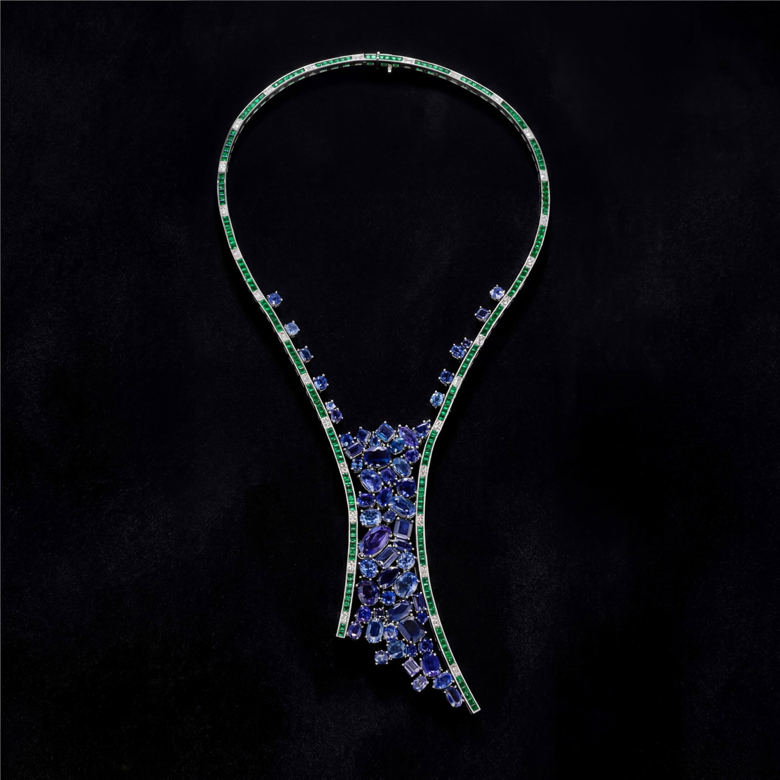 73.6 ctw Blue Sapphire and 3.6 ct White Diamond Platinum Necklace: Retail Value: $133,020 Exuding opulence and grace, this magnificent Blue Danube necklace featuring Blue Sapphire, Tanzanite, Emerald, White Diamond is crafted for the distinguished. Showcasing the gem