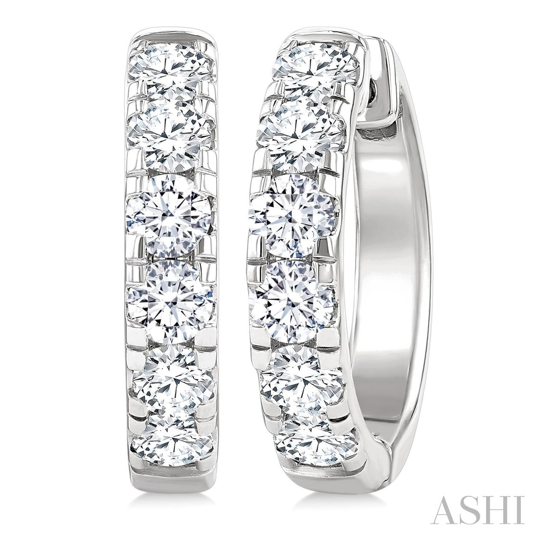1.50 ctw Round Diamond Hoop 14K White Gold Earrings: Rare and radiant, this breathtaking Hoop pair of earrings featuring White Diamond offers a touch of the extraordinary. A detailed Hoop gallery secures the stones, rendered in 6.1 grams of lustrous 14K