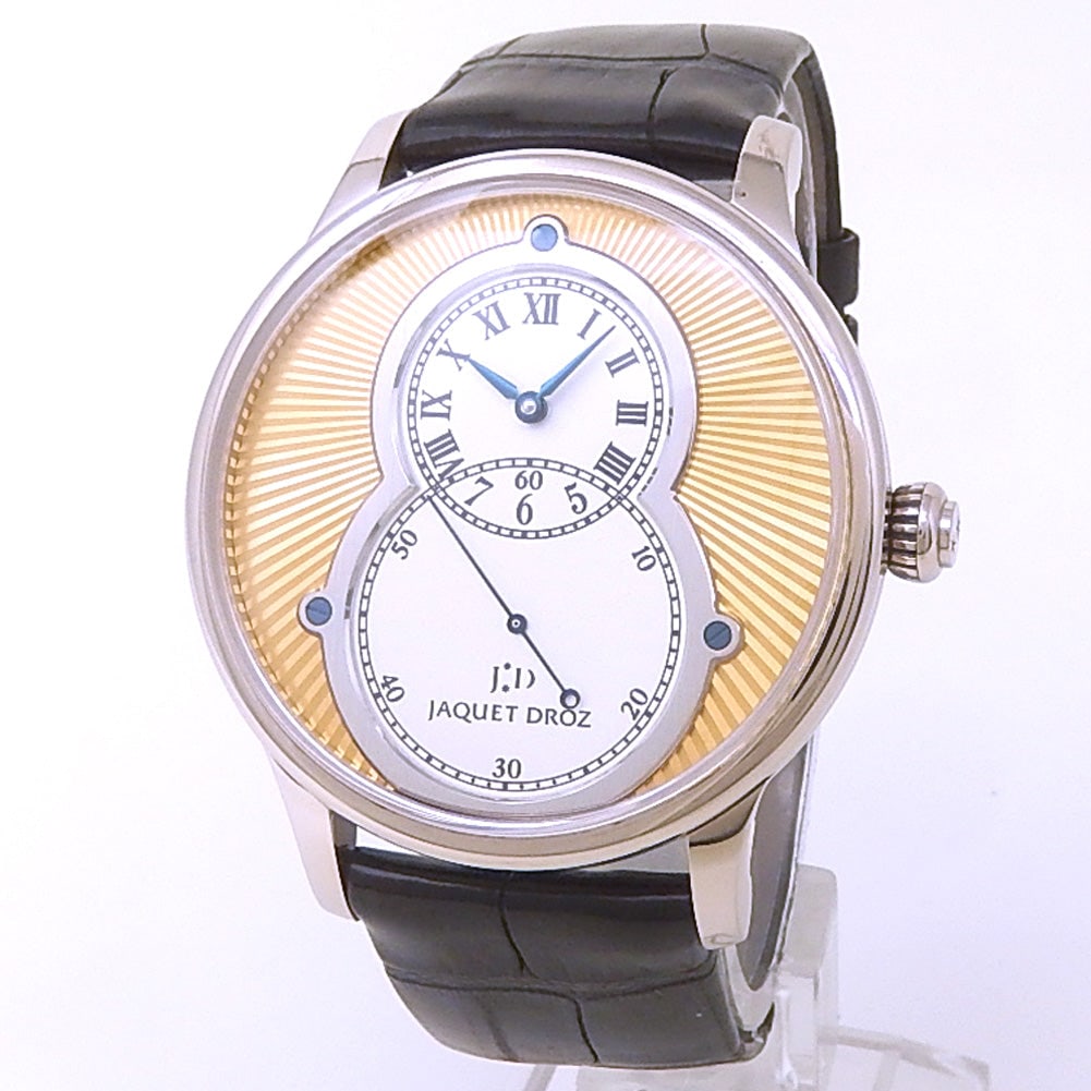 Jaquet Droz Grande Seconde J003034207 18k White Gold Yellow & Silver Dial: The Jaquet Droz Grande Seconde, Reference J003034207, is a study in refined elegance. Crafted in 18k white gold, this gents' watch features a stunning yellow and silver dial that radiates understa