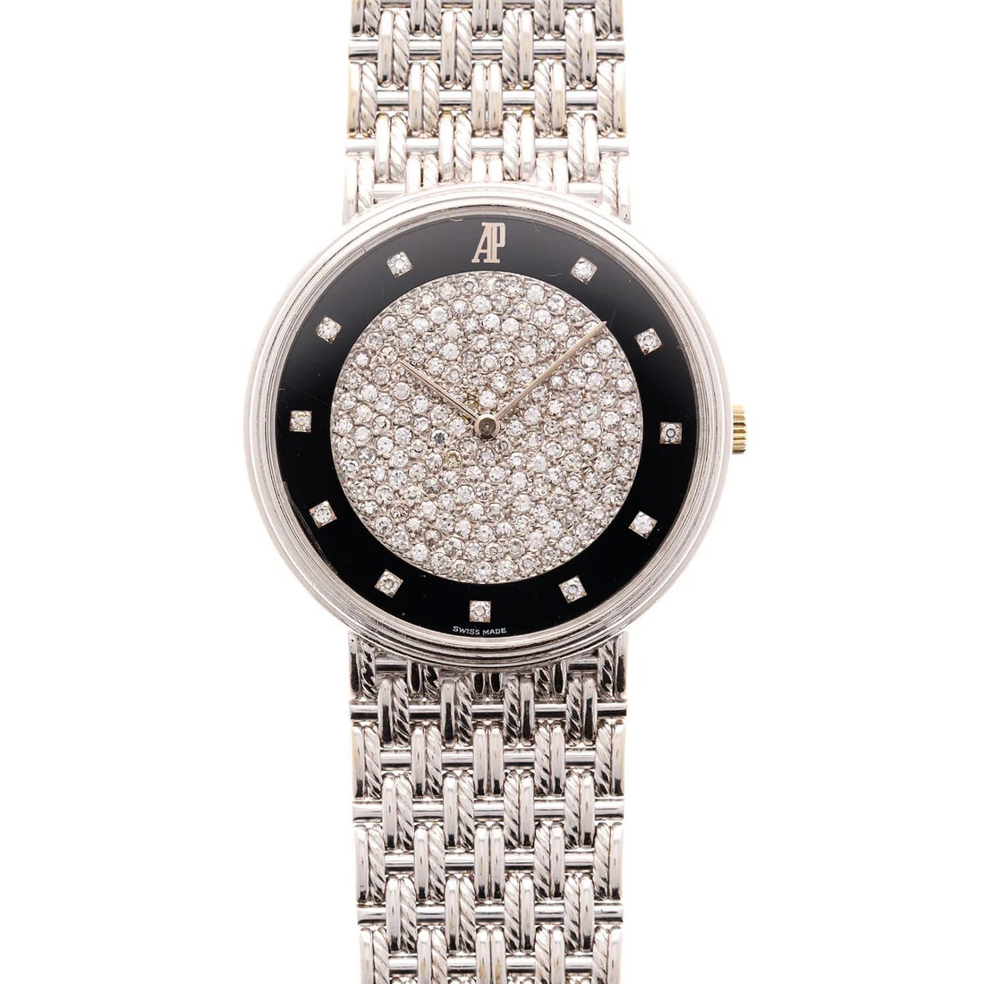 Audemars Piguet 56301 18K White Gold Pave Diamond Black Onyx Dial 31mm: The Audemars Piguet 56301 is a vision of opulent elegance. Encased in luminous 18K white gold, this vintage-inspired timepiece showcases a breathtaking black onyx dial, lavishly accented by a pave