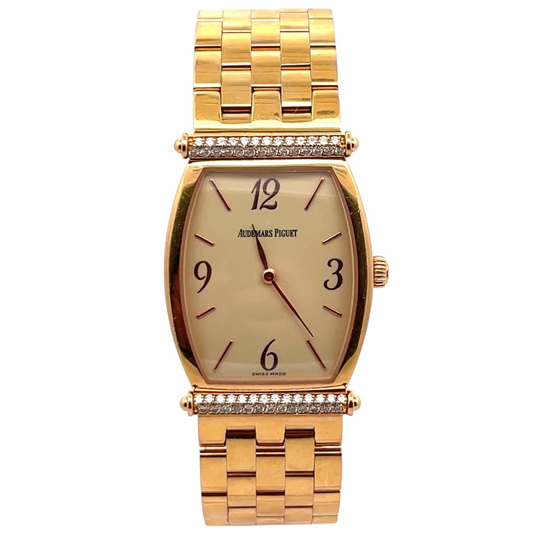 Audemars Piguet Carnegie 14944BA Yellow Gold Diamond-Set Champagne Dial: The Audemars Piguet Carnegie, Reference 14944BA, is a captivating expression of Swiss luxury. Crafted in yellow gold, this women's timepiece features a stunning Champagne dial that radiates warmth