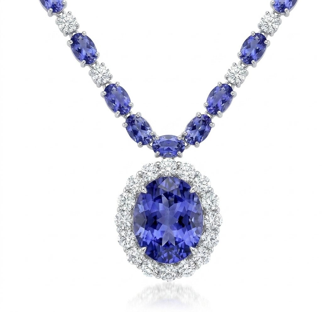 Tanzanite and Diamond Necklace in 14K White Gold: Featured Collection: The Kelly Christie Collection Exclusively Curated By: Serenity Gallerie The Kelly Christie Collection crafts heirloom-quality masterpieces designed not just to adorn, but to captu