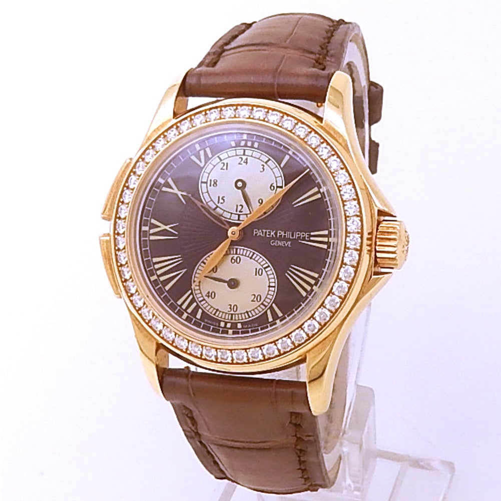 Patek Philippe Calatrava Travel Time 4934R-001 18k Rose Gold Brown Dial: The Patek Philippe Calatrava Travel Time, Reference 4934R-001, represents an exquisite fusion of high horology and graceful design. Masterfully crafted in 18k Rose Gold, this ladies' timepiece showcas