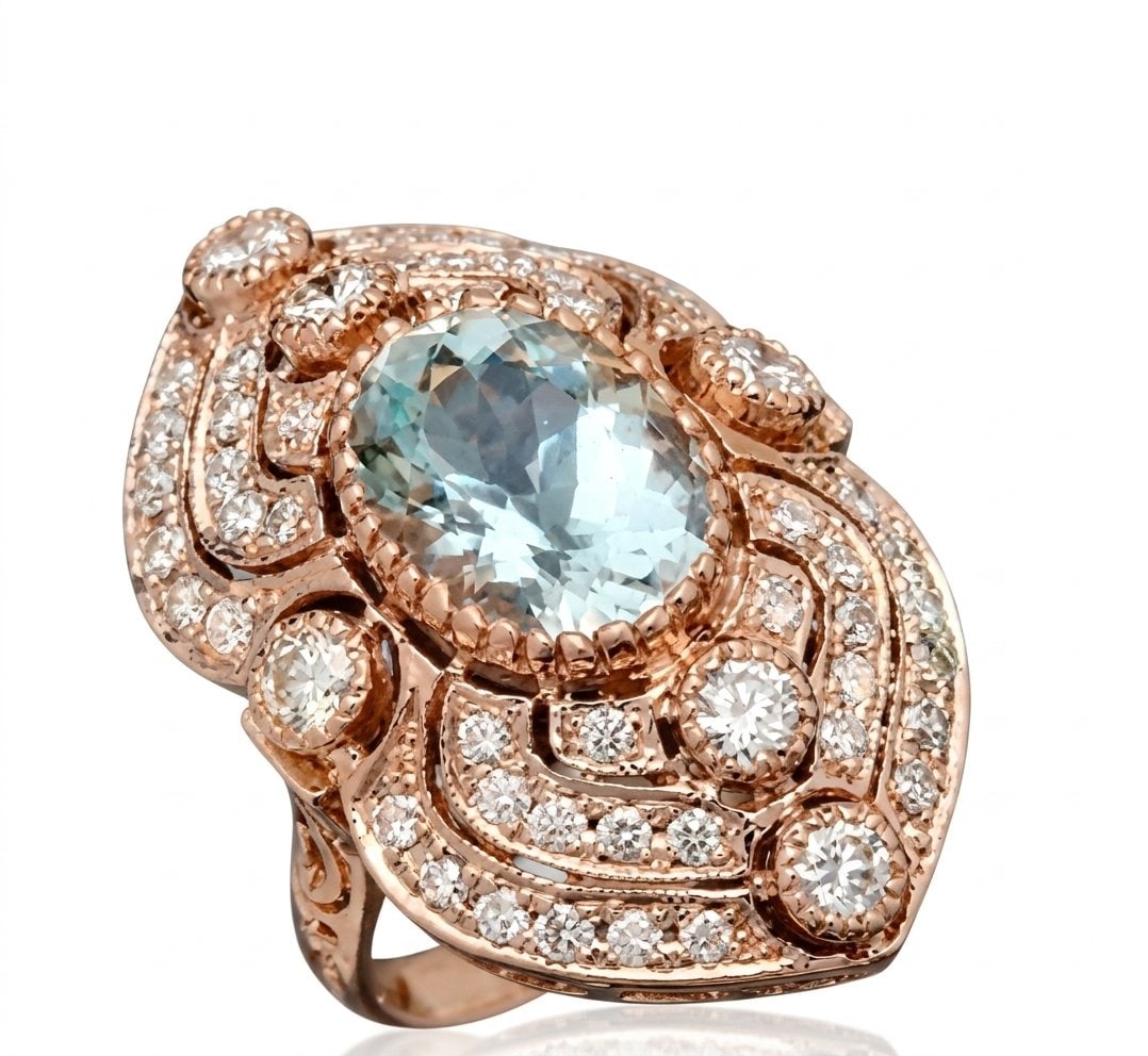 Aquamarine and Diamond Ring in 14K Rose Gold: Featured Collection: The Kelly Christie Collection Exclusively Curated By: Serenity Gallerie The Kelly Christie Collection crafts heirloom-quality masterpieces designed not just to adorn, but to captu