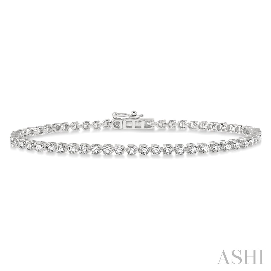 3.03 ctw Round Cut Diamond Tri-Prong 14K White Gold Tennis Bracelet: A vision of luxury, this magnificent Tri-Prong bracelet featuring White Diamond defines sophistication. The gemstones are nestled within a Tri-Prong framework, supported by a substantial 7.6 grams 14K