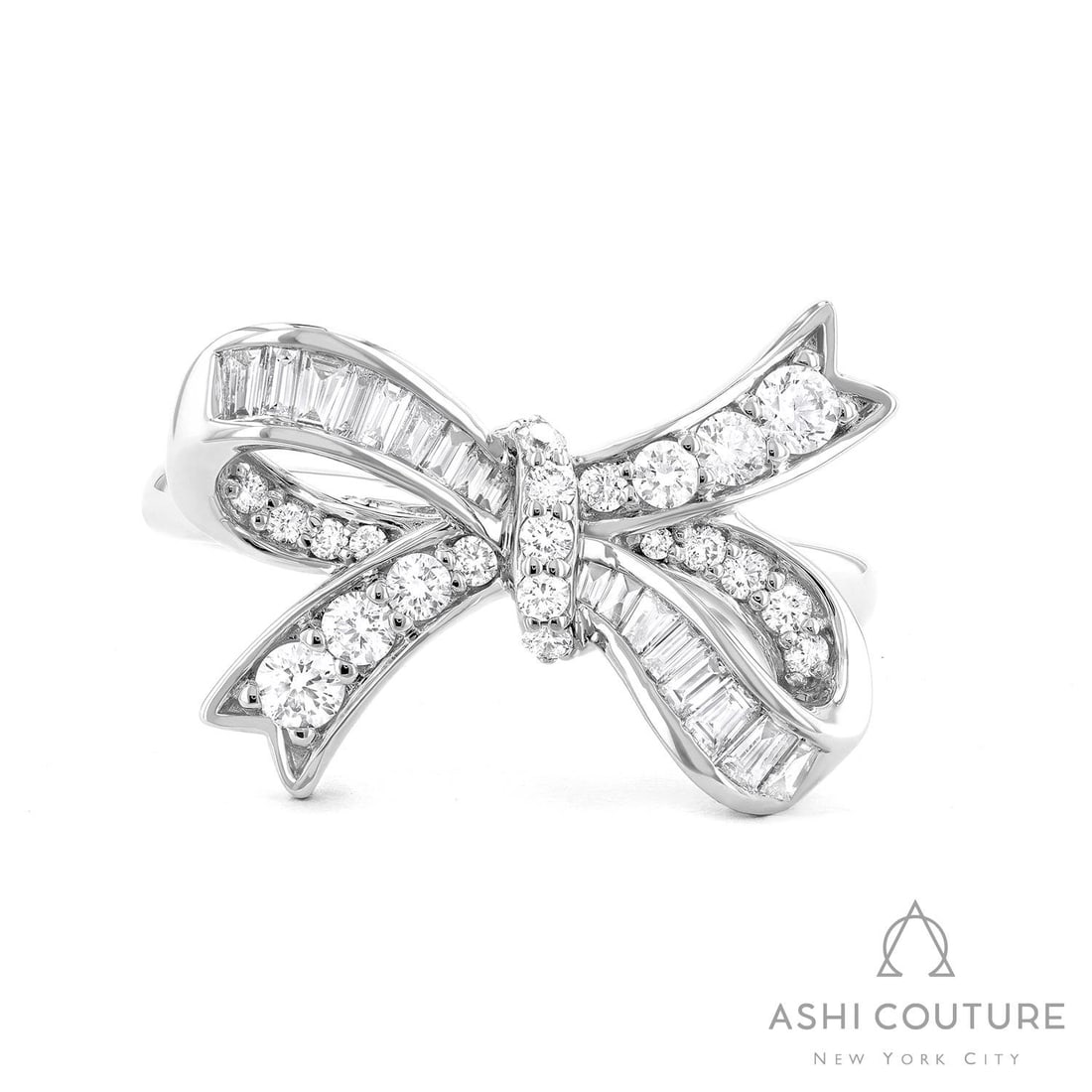 0.68 ctw Bow Tie Diamond Ring 18K White Gold: Rare and radiant, this magnificent Bow Tie ring featuring White Diamond offers a touch of the extraordinary. A detailed Cluster gallery secures the stones, rendered in 6.7 grams of lustrous 18K White 